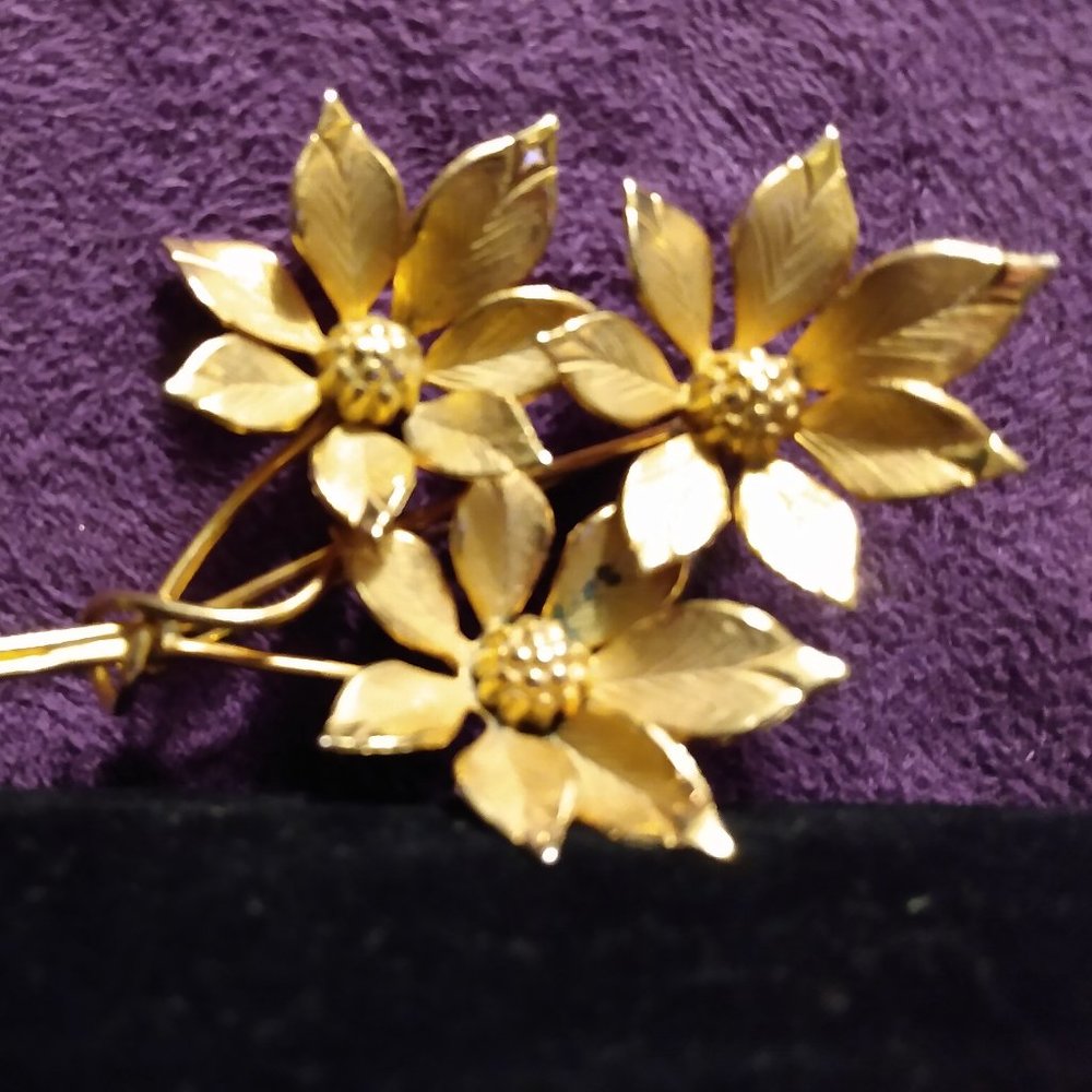 Gold tone Poinsettias